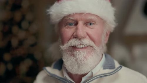 Senior Man in Santa Hat Smiling