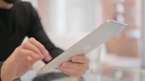 Close up of Man Hand Using Tablet PC