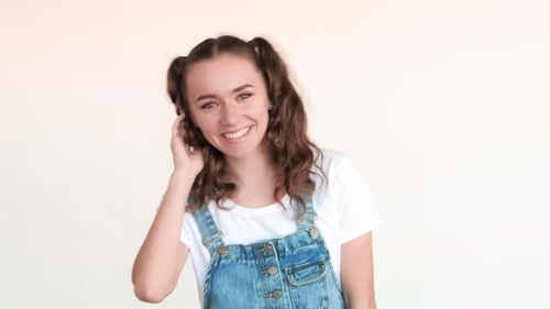 Smiling Woman with Pigtails Posing