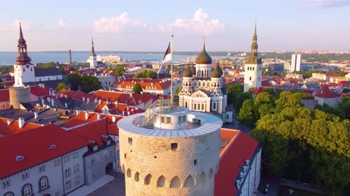 Aerial cityscape view over traditional and historical buildings with towers in Tallinn, Estonia