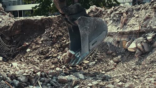 Bulldozer Removes Debris From A Collapsed House 3