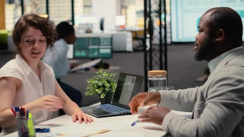 HR Manager Welcoming New Hire to the Team with a Handshake