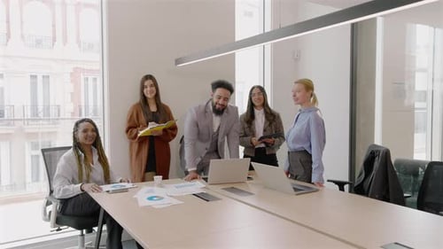 A Variety of Diverse Professionals Working Together in a Dynamic Modern Office Environment