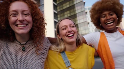 Diverse Group of Friends Laughing in City