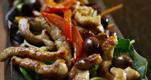 Close Up of Savory Pork Dish with Vegetables