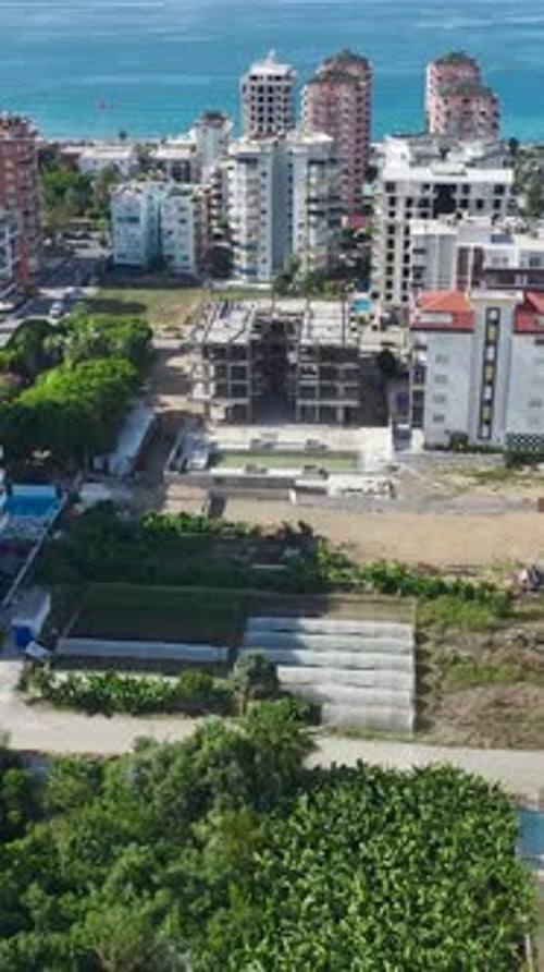 Construction Site Aerial View in Coastal City