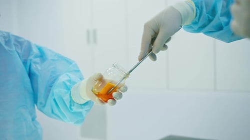 Surgical Team Handling Samples and Tools in Hospital