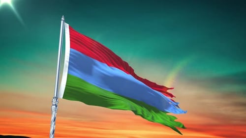 Waving Red Blue Green Flag against Dramatic Sunset Sky