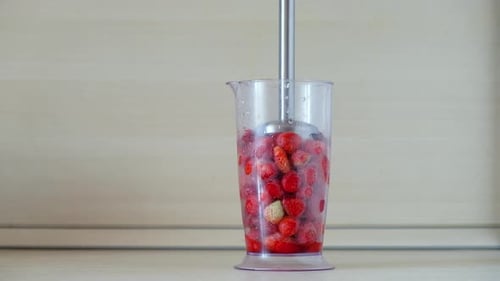 Healthy Eating Cooking Kitchen Appliances Concept Close Up of Blender Shaker with Fruits and Berries