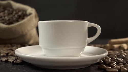 Close-up of Coffee Beans and Cup