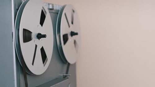 Analog Reel-to-Reel Tape Deck Playing Music