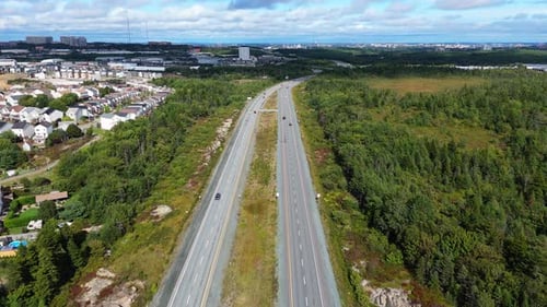 Highway Motion Time With Vehicles Leaving Halifax On A Road Across Countryside