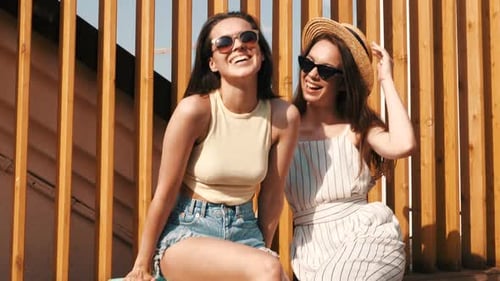 Stylish Women Enjoying Sunny Day in the City