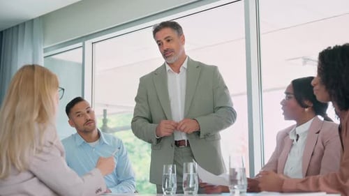 Happy Senior Business Man Manager Working with Diverse Team at Office Meeting