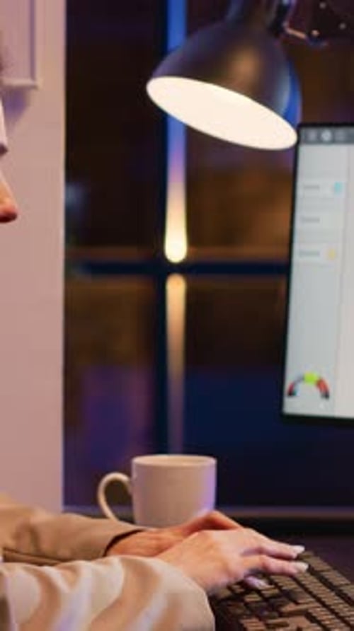 Vertical Video Female Worker Analyzing Financial Investment Graphs