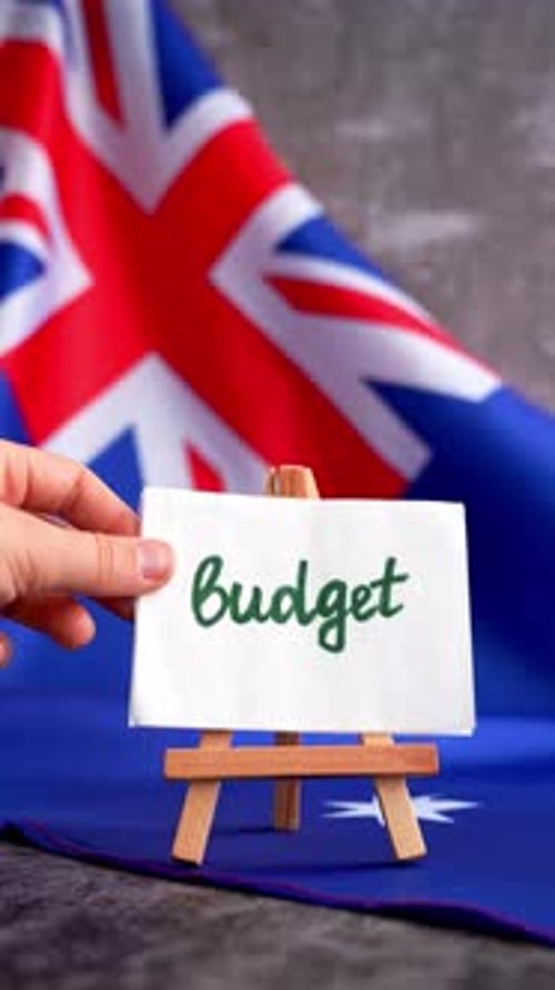 Australian Flag Background with Text BUDGET for Financial Reports Concept of Fiscal Planning and