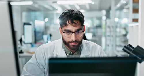 Science, laboratory and man on laptop for medical study, online research and website