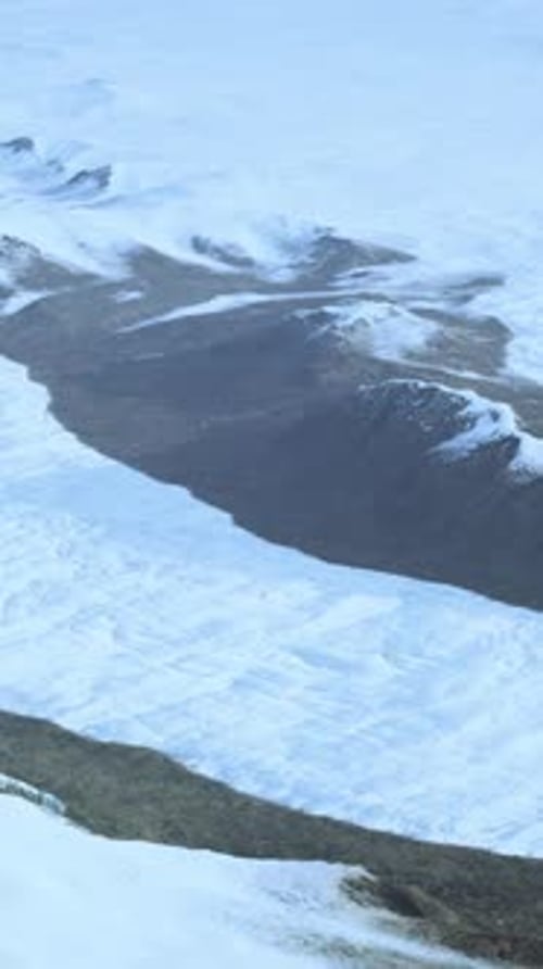 Snowcovered Mountain Range Taken From Above