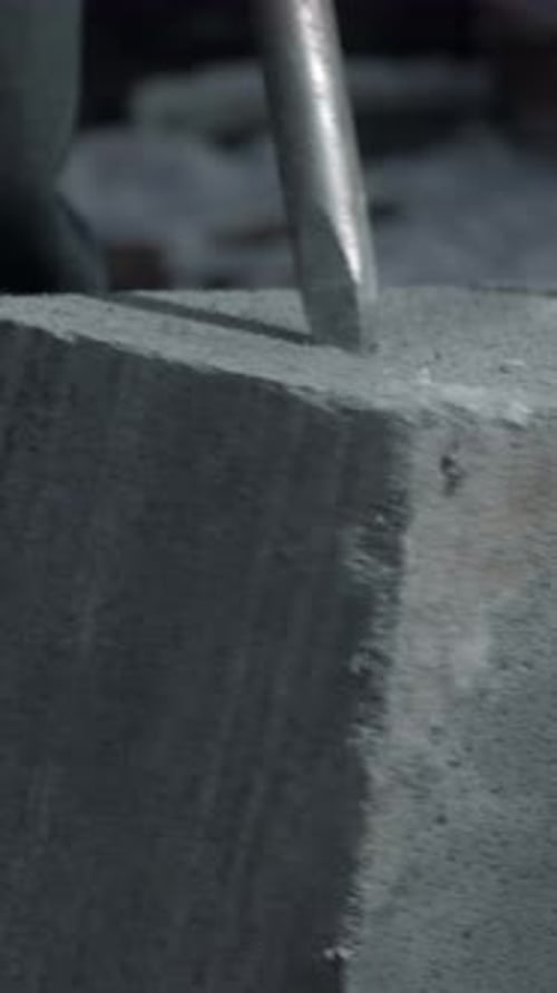 Close Up of Drilling a Cement Block Clip Industrial Works at the Construction Site