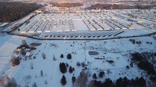 A Breathtaking Aerial View of a SnowCovered Landscape with a Beautifully Blurred Background in Focus
