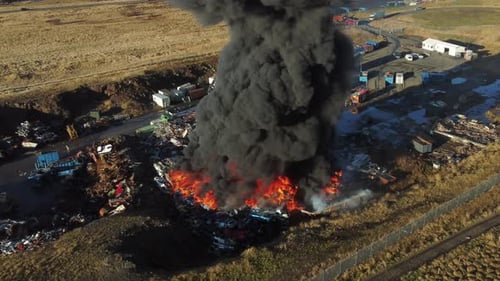 Huge Car Junkyard Fire Black Oil Smoke Pollutes the Atmosphere Ecological Disaster Global Warming