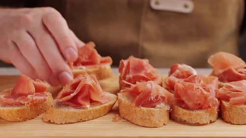 Jamon Iberico Tapas Close Up Chef Cooking the Best Spanish Ham Pork Tapas Cafe with Traditional Food