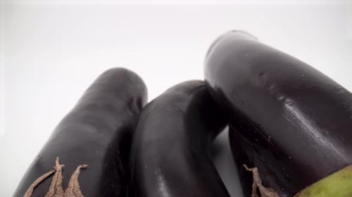 Eggplants close up on white background isolated 4K