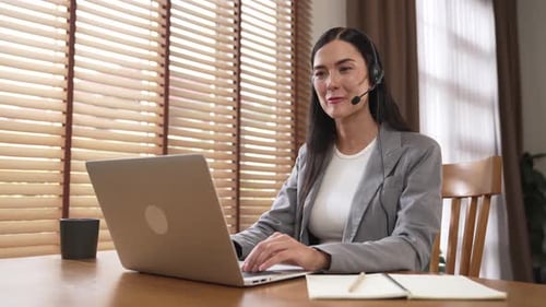 Female call center operator or customer service helpdesk staff. Blithe