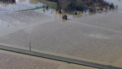Aerial view of floodwaters engulfing fields, Sainte-Croix-du-Mont, France.