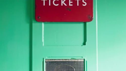 Red retro British Railways tickets sign above office pay counter