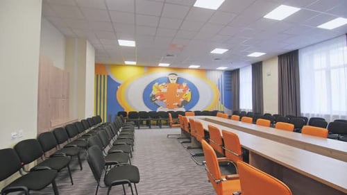 Round Table for Discussions Painted on Back Wall of Meeting Hall