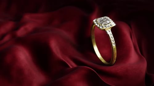 Elegant Diamond Engagement Ring on Red Silk Background