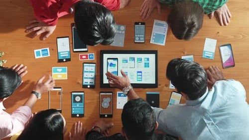 Top view of software developer team looking Ux design from tablet. Convocation.