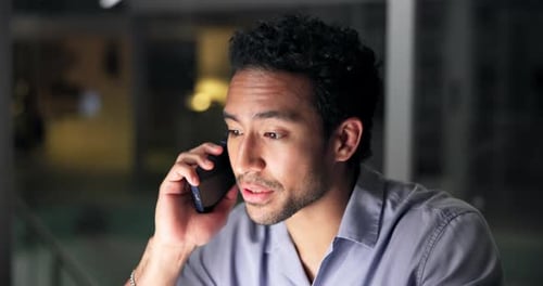 Happy man, night and discussion with phone call in office for online advice, help or conversation