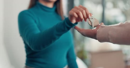 Hands, new home and realtor with key for buyer, property sale or real estate purchase