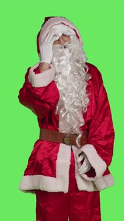 Vertical Video Front View of Father Christmas with Painful Headache