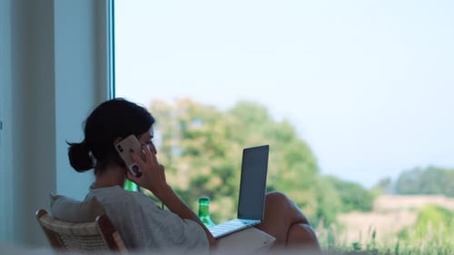 Freelance Woman Professional Taking a Call. Remote Work and Home Office