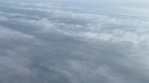 Aerial View of Billowing White Clouds in Sky