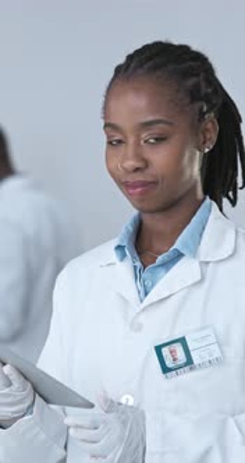 Tablet, science and face with black woman in laboratory for medical, healthcare