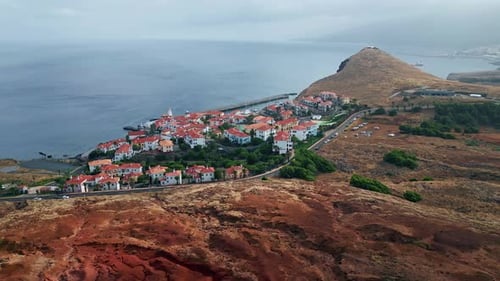 Aerial Coastal Mediterranean Town Overlooking Endless Sea Horizon Cozy City