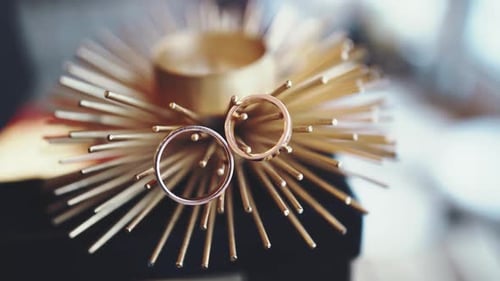 Wedding Gold Rings on a Beautiful Stand
