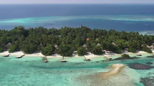 Amazing aerial view of Maldives islands with turquoise water, palms and white sand . 4K timelapse. P