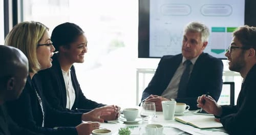 Diverse Business Team Meeting in Modern Office