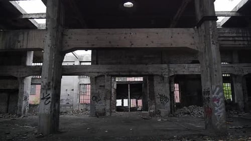 Destruction and debris in crumbling halls, abandoned scary place - urban exploration (slow motion)