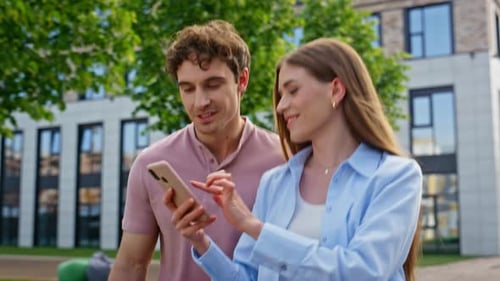 Smiling Couple Looking Smartphone Walking Beautiful Street Together Closeup