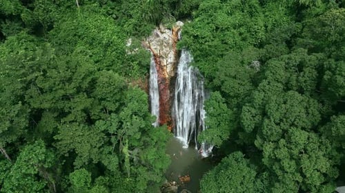 Aerial View Waterfall Nestled in Tropical Jungles Natural Beauty Waterfall Jewel Among Greenery