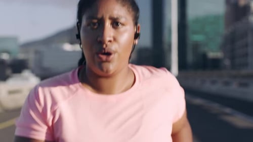 Woman Jogging on City Street, Close Up