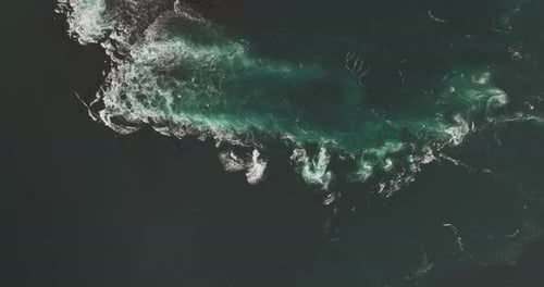 Danger and beauty in speeding water current, Saltstraumen strait. Aerial