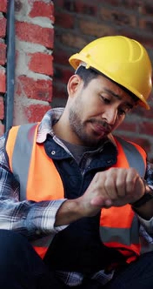Stress, contractor or man with watch at construction site, building material delivery or check time