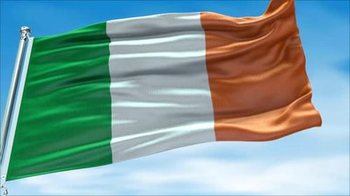 Irish Flag Waving in the Wind with Blue Sky